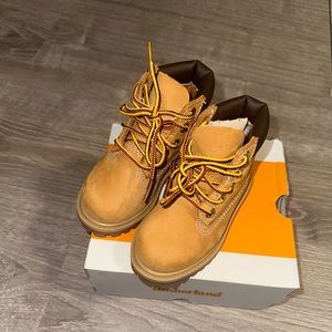 Gently used kids construction timbs